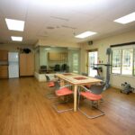 an occupational therapy room and kitchen